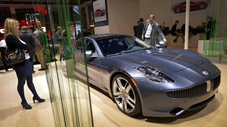 A Fisker Karma luxurious electric car is seen at the...