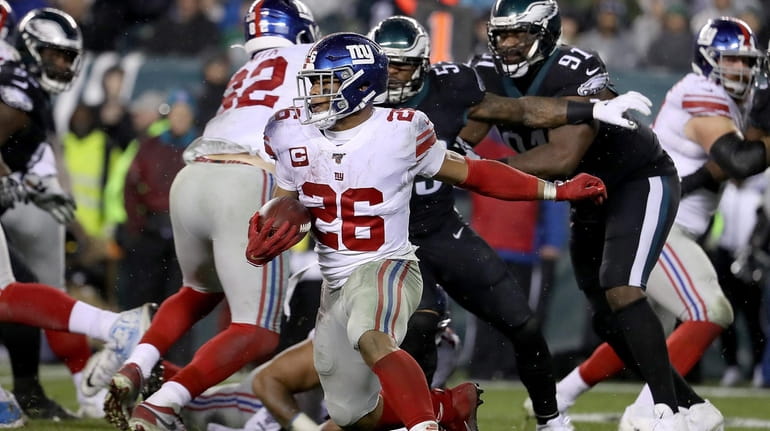 Giants' Saquon Barkley looks for running room against the Eagles. 