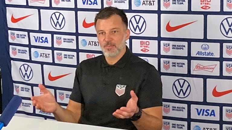 U.S. men’s national team assistant coach Anthony Hudson speaks with...
