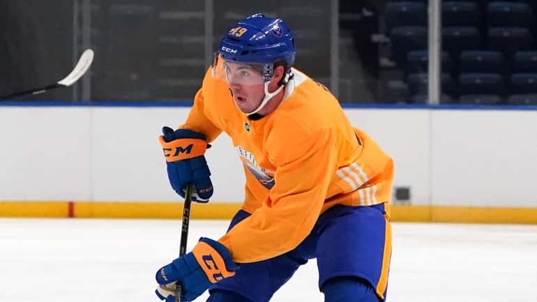 C.J. Smith skates with the puck during Sabres training camp at...