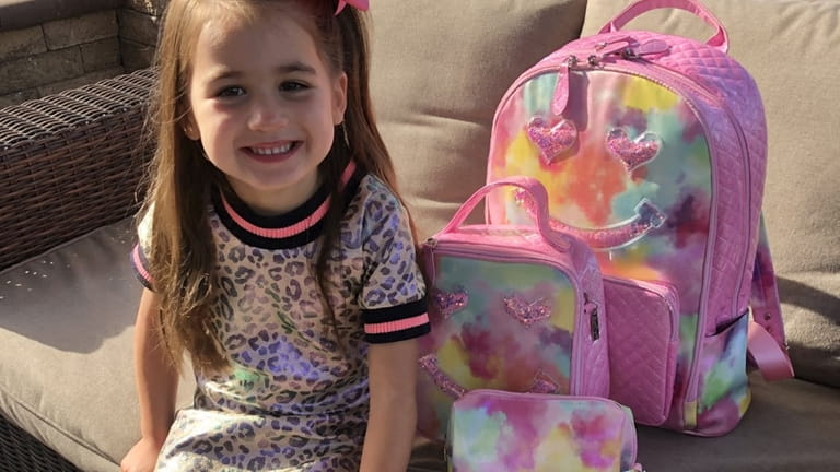 Juliette Sluker, 4, of Islip, has a matching backpack, lunchbox...
