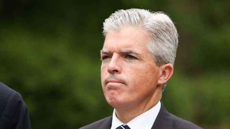 Suffolk County Executive Steve Bellone looks on during a news...