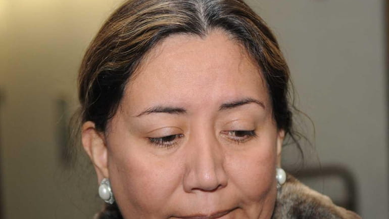 Carol Gonzalez, daughter of Juan Gonzalez, at Riverhead Criminal Court...