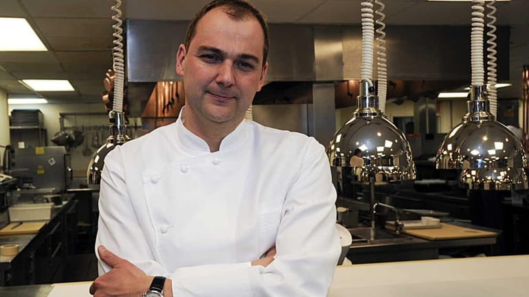 Chef-owner Daniel Humm poses at Eleven Madison Park, in an...
