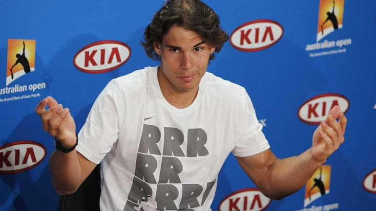 Spain's Rafael Nadal gestures during a press conference at the...