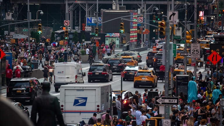 A view of dense traffic in Times Square on a...