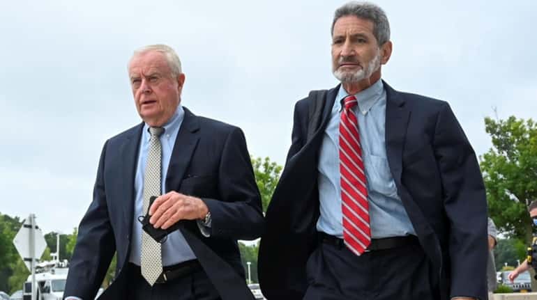 Former District Attorney Thomas Spota, center, arrives at federal court...