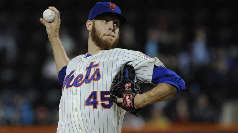 Mets starting pitcher Zack Wheeler delivers against the Washington Nationals...