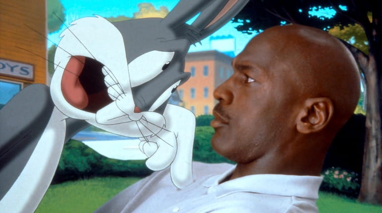 Bugs Bunny and Michael Jordan, pictured in a scene from...