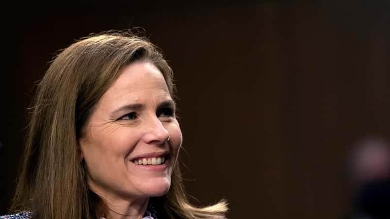Supreme Court nominee Amy Coney Barrett testifies during the third...