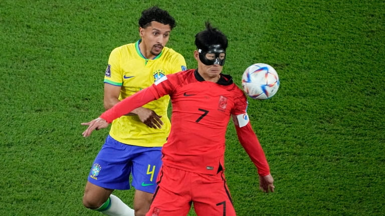 Brazil's Marquinhos, left, and South Korea's Son Heung-min compete for...