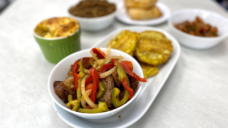 Pork griot and other Haitian specialties at Pops & Poosh...