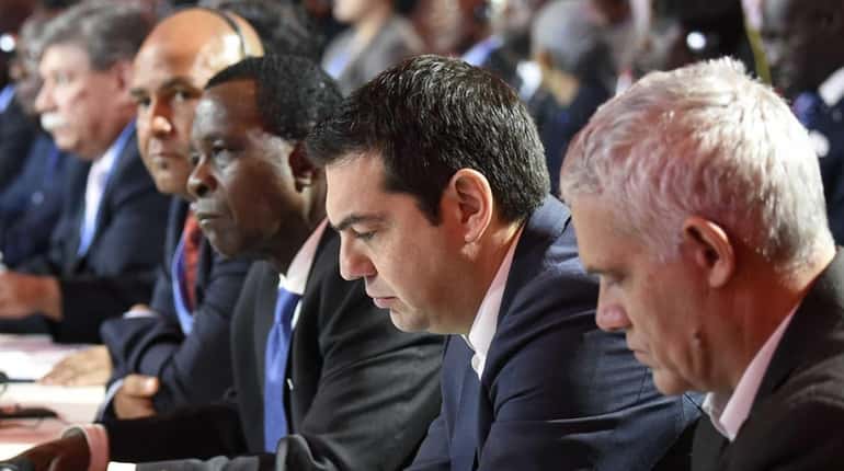 Delegates attend the inaugural session of the COP 21 United...