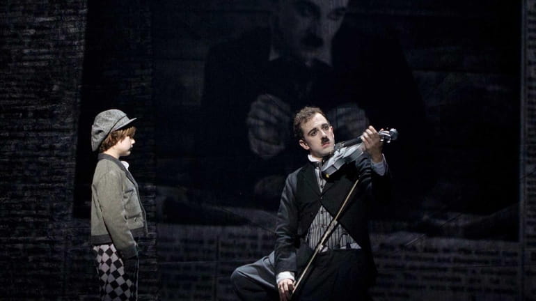 Zachary Unger as young Charlie Chaplain and Rob McClure as...