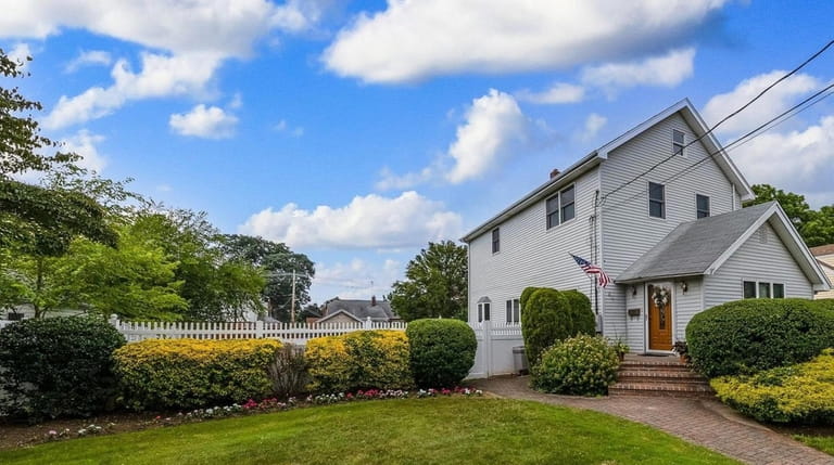 This four-bedroom home with an above-ground pool in Rockville Centre...