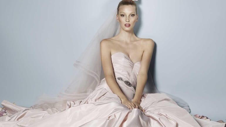 Soft colors are in vogue: This mermaid-fit Watters gown is...