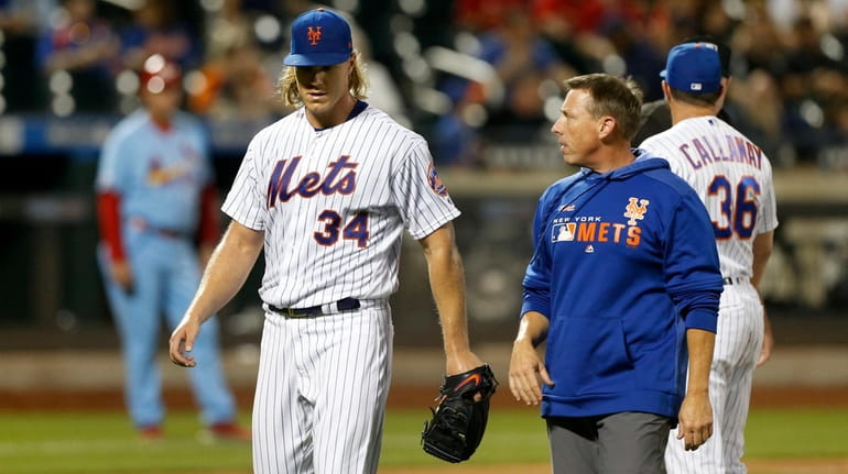 Noah Syndergaard of the Mets leaves a game against the Cardinals in...
