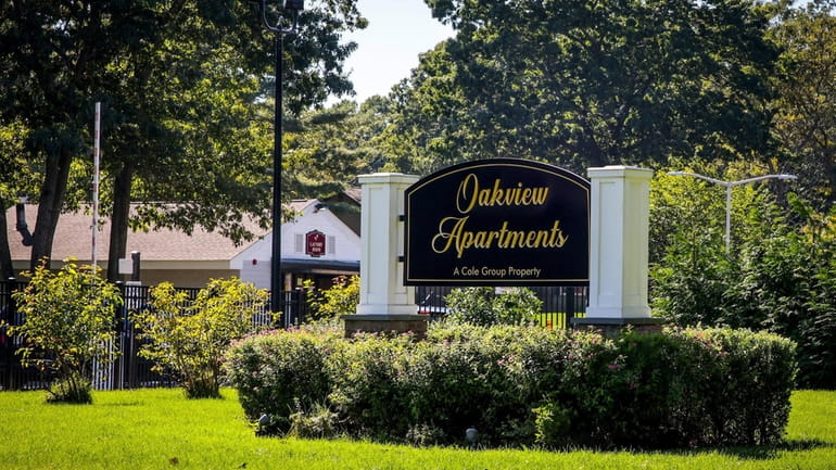 The Oakfield Apartments gated community in Coram has agreed to...