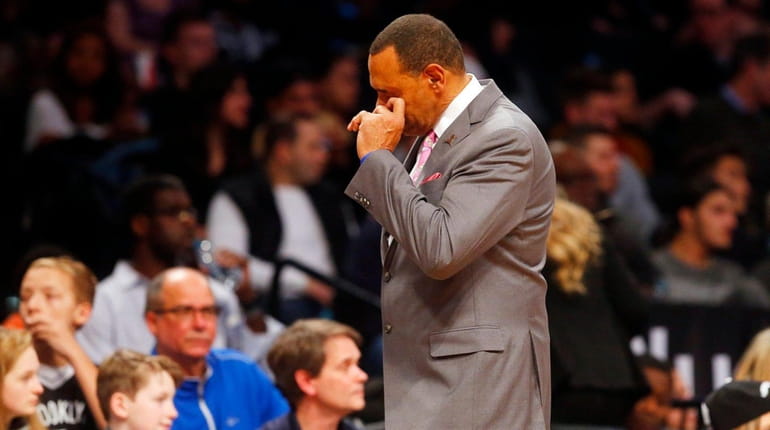Head coach Lionel Hollins of the Brooklyn Nets reacts in...