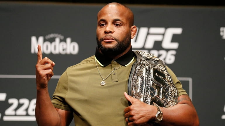Daniel Cormier poses during a news conference for UFC 226 on...
