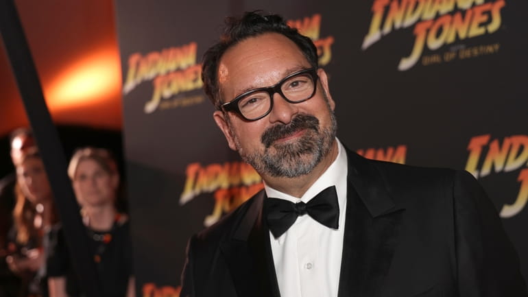 Director James Mangold poses for photographers upon arrival for the...