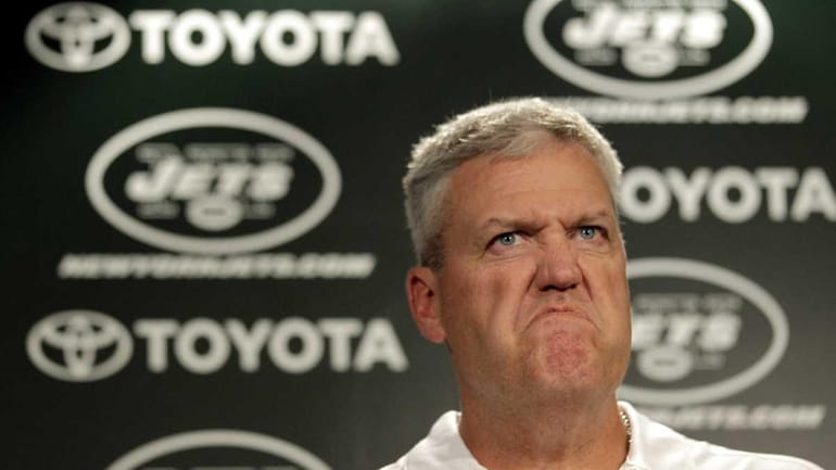 Jets head coach Rex Ryan reacts as he talks to...