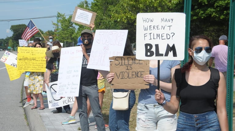 Black Lives Matter protesters on Nesconset Highway in Port Jefferson on Saturday.