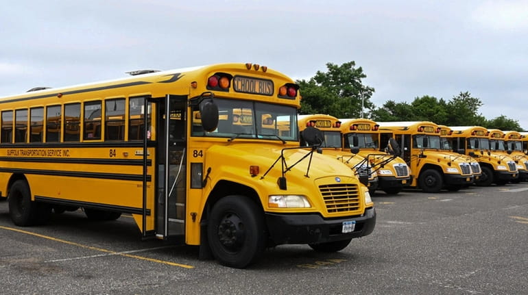 Suffolk Transportation school buses sit in the bus depot in Ronkonkoma...
