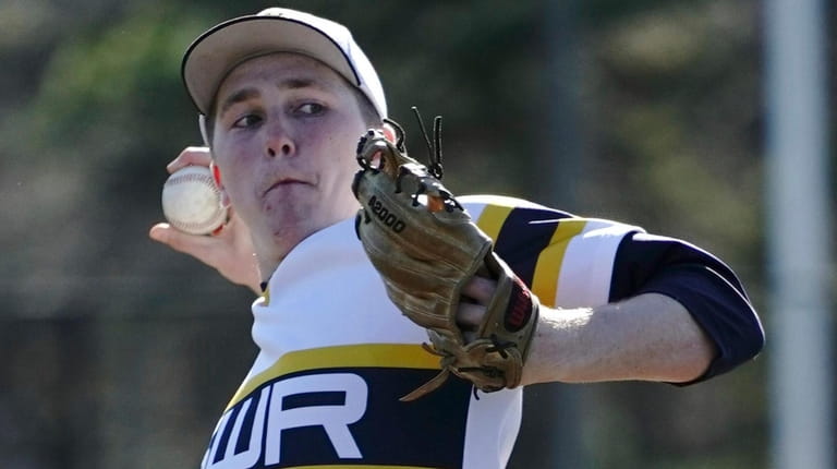 Shoreham-Wading River pitcher Aidan Crowley (18) delivers against Hauppauge during...
