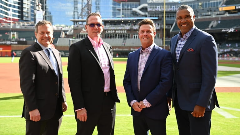 From left, Buster Olney, David Cone, Karl Ravech and Eduardo...
