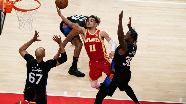 Atlanta Hawks' Trae Young (11) shoots against New York Knicks'...