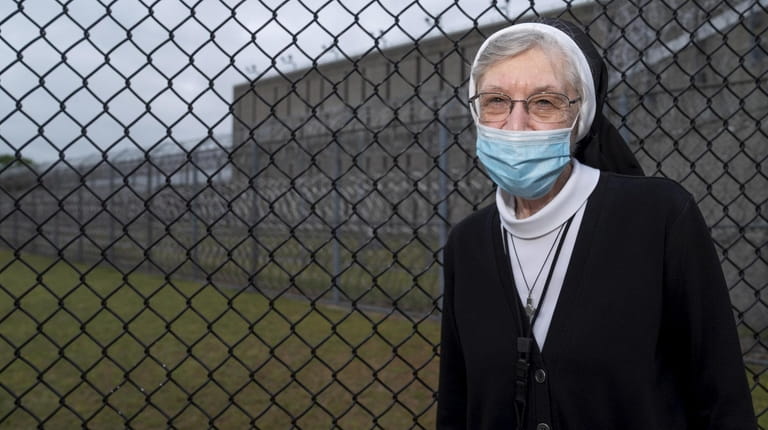 Sister Michelle Bremer stands outside of the Suffolk County Correction...