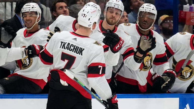 Ottawa Senators left wing Brady Tkachuk (7) celebrates with the...