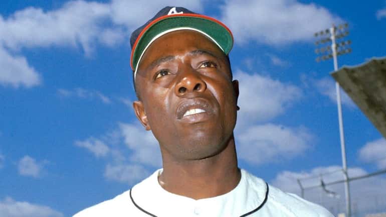 Hank Aaron, here in March 1967, hit at least 20 home...