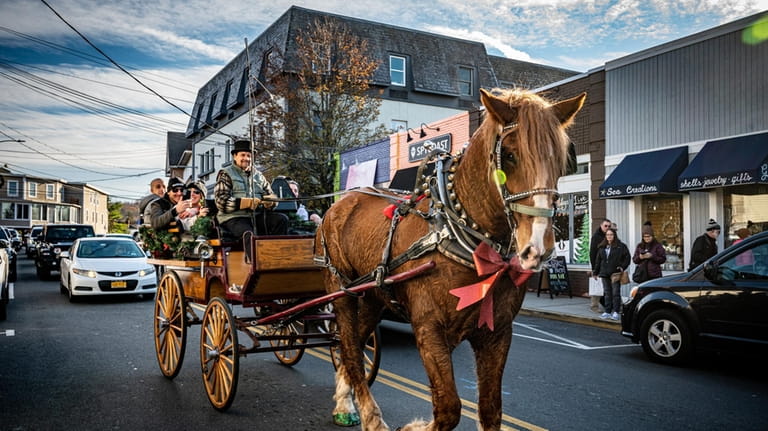 Enjoy a carriage ride at the Dickens Festival in Port...