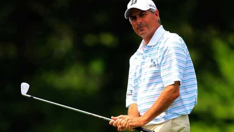 Fred Couples chips to the 12th hole during the second...