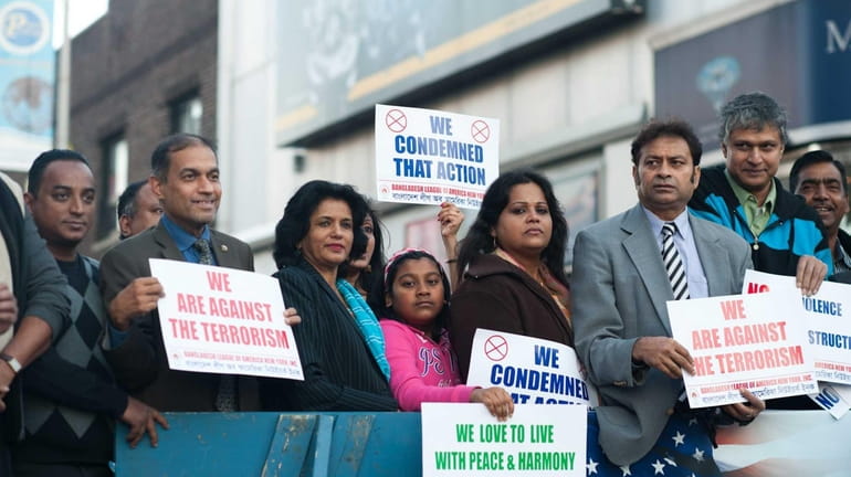 Members of the Bangladeshi community come together in Jackson Heights,...