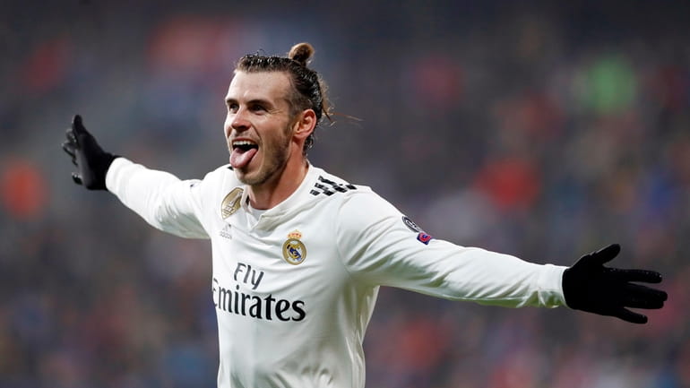Real Madrid midfielder Gareth Bale celebrates after scoring his side's...