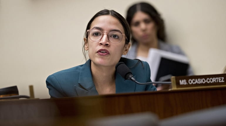 Rep. Alexandria Ocasio-Cortez (D-N.Y.), questions Tim Sloan, president and chief...