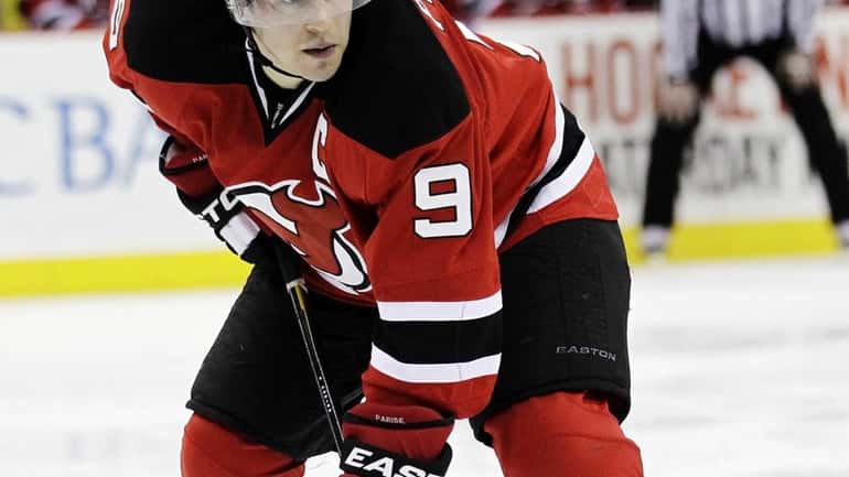 New Jersey Devils' Zach Parise waits for action to resume...