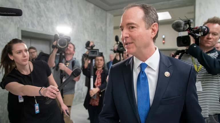 House Intelligence Committee Chairman Adam Schiff (D-Calif.), evades reporters as...