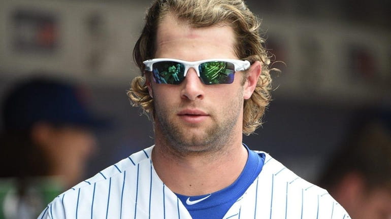 New York Mets left fielder Kirk Nieuwenhuis looks on from...