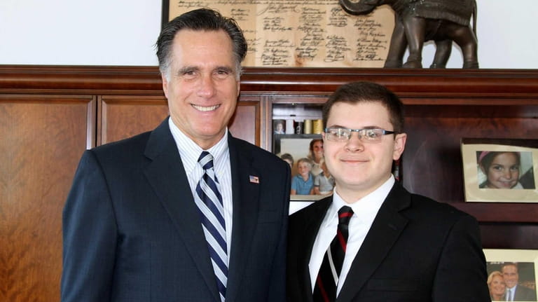 Adam Savader with Mitt Romney in an undated photo from...