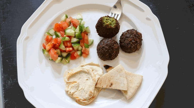 Falafel, Israeli salad, pita and hummus prepared by Irene Coppersmith...