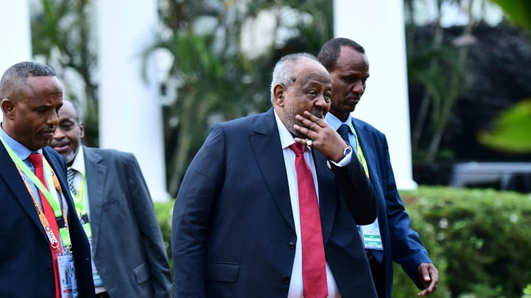 Djibouti President, Ismail Omar Guelleh, centre, attends the IGAD summit...