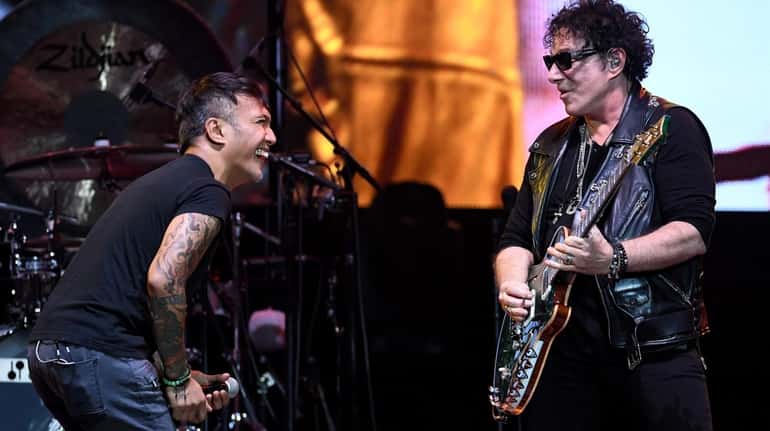 Arnel Pineda, left, and guitarist Neal Schon of Journey will join...