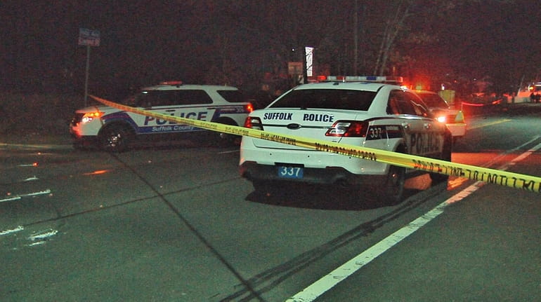 Suffolk County police on the scene where a pedestrian was...