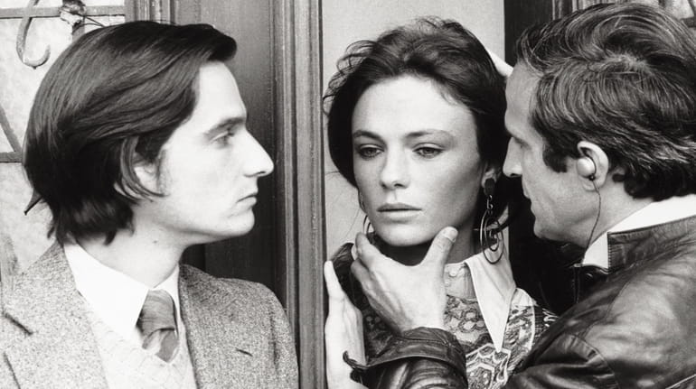  Francois Truffaut touches the face of  actress Jacqueline Bisset in...