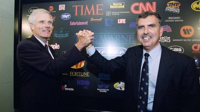 Turner Broadcasting Chairman and President Ted Turner, left, and Time...