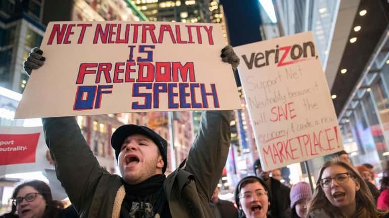 Demonstrators rally in support of net neutrality earlier this month.